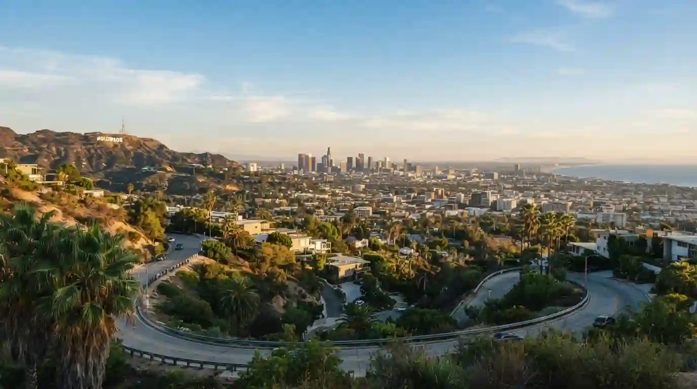 Los Angeles skyline, Hollywood Hills, and Pacific coastline at golden hour
