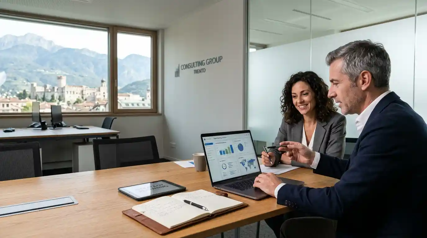 Business executives reviewing digital marketing performance in a modern office in Trento, Italy.